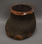 A Victorian taxidermy specimen of a preserved Elephant's foot loxodonta formed as a coal bucket.