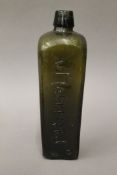 A West Indies V Marken & Co gin bottle. 23.5 cm high.