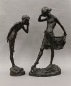 A pair of late 19th/early 20th century bronze figures,