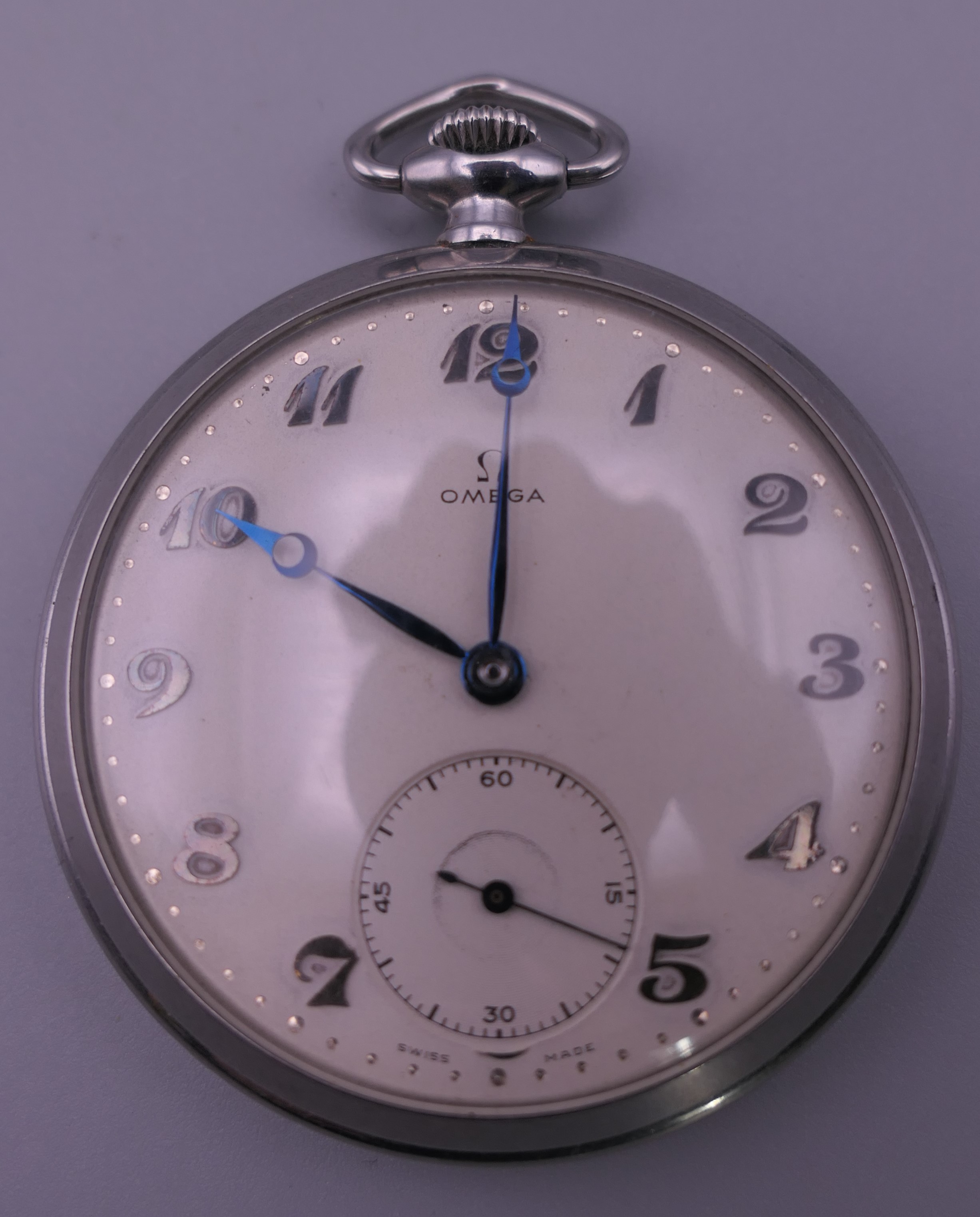 An Omega gentleman's pocket watch. 5 cm diameter.