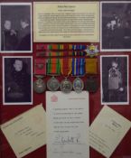 A framed display Gallantry British Empire medal with oak leaf and box,