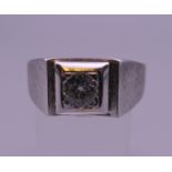 A 14 K white gold gentleman's diamond ring. Ring size Z.