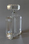 A large cut glass perfume bottle.