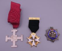 A silver and enamel Masonic cross inscribed LDRA,