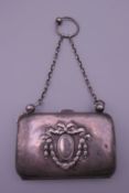 A silver purse. 8 x 5.5 cm.