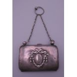 A silver purse. 8 x 5.5 cm.