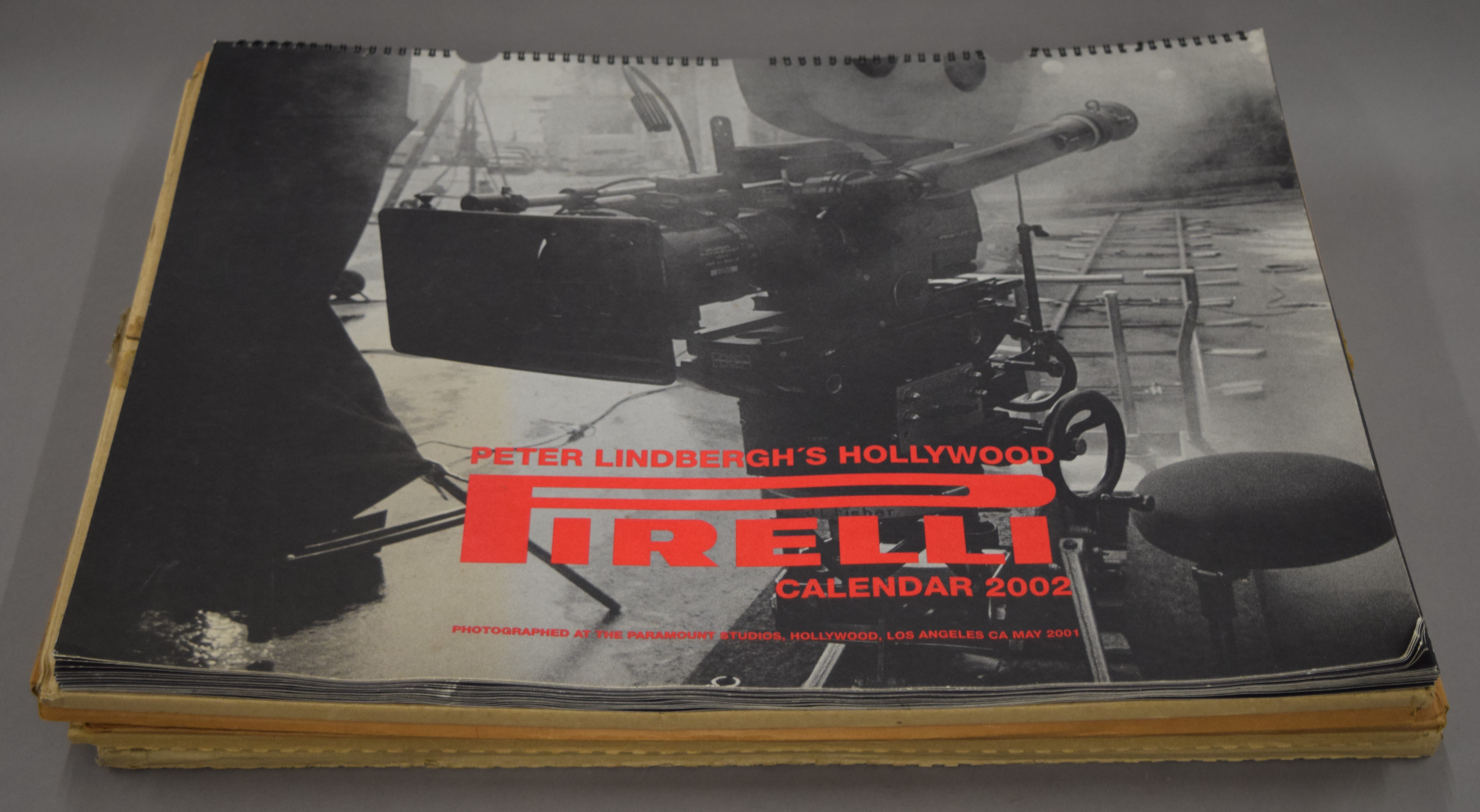 Six Pirelli calendars (five boxed).