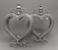 A pair of silvered heart shape lanterns. 52 cm high.