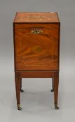 A Victorian inlaid mahogany cellarette. 30 cm wide.