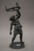 A patinated bronze model of Hercules. 42.5 cm high.