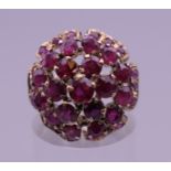 A vintage 14 K gold ruby cocktail ring (one stone lacking). Ring size K/L.