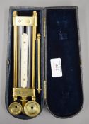 A Victorian cased scientific instrument, inscribed GL & C CO. The case 23.5 cm long.