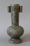 A Chinese archaistic style bronze arrow vase. 28 cm high.