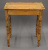 A small Victorian pine side table. 68 cm wide.