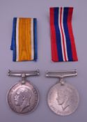 A WWI service medal and a WWII service medal, the 1914-18 medal awarded to S-24194 Pte D McInnes,
