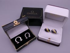 Two pairs of modern boxed cufflinks, Omega and Hackett. Hackett 2 cm wide, Omega 1.65 cm high.