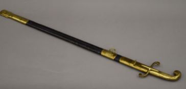 A 19th century Russian/Turkish sword in scabbard. 88.5 cm long.