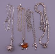 Four silver pendants on silver chains. Elephant pendant chain 60 cm long, elephant pendant 2.