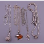Four silver pendants on silver chains. Elephant pendant chain 60 cm long, elephant pendant 2.