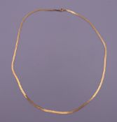 A 9 ct gold necklace. 40 cm long. 2.8 grammes.