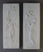 A pair of plaques depicting fairies. The largest 32 cm high.