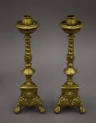 A pair of antique Dutch brass candlesticks. 40 cm high.