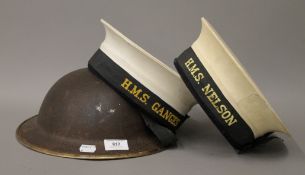 Two Navy hats for HMS Nelson and HMS Ganges, and a helmet.