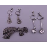 Two pairs of French Art Deco earrings and a marcasite brooch. Brooch 5.