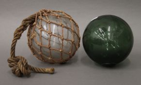 Two vintage glass floats.