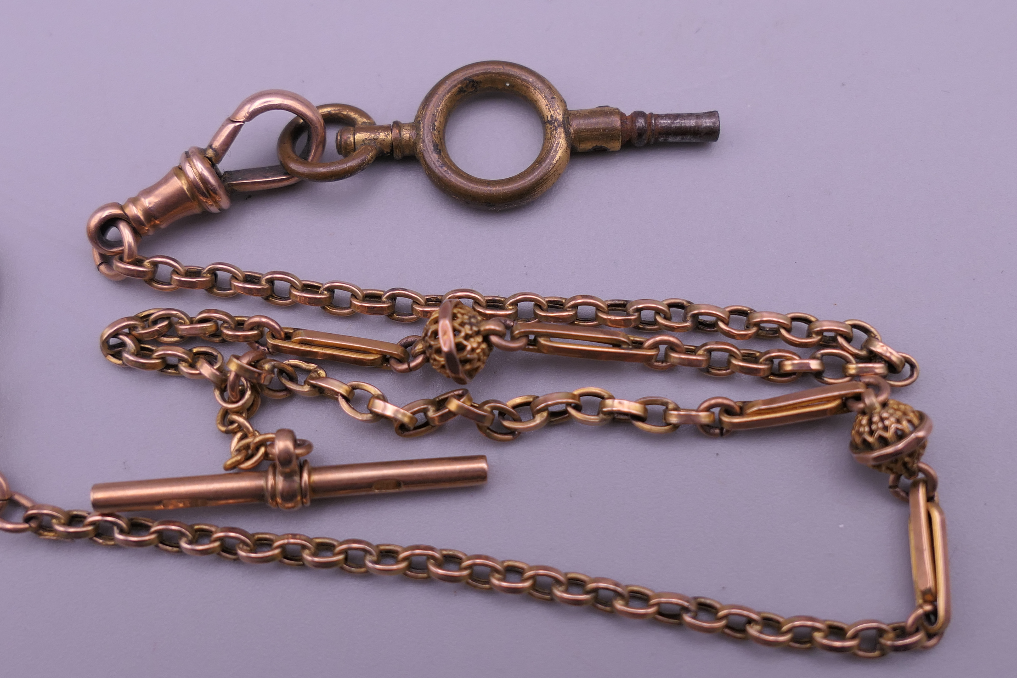 A ladies 14 K gold pocket watch (33 grammes total weight) on a 9 ct gold chain (7 grammes). Watch 3. - Image 10 of 13