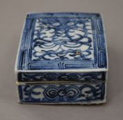 A 19th century Chinese blue and white porcelain box. 10 cm wide.