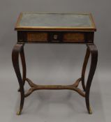 A 19th century brass inlaid rosewood mirror topped side table. 56.5 cm wide.