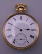 An 18 ct gold pocket watch. 5 cm diameter. 97.3 grammes total weight.