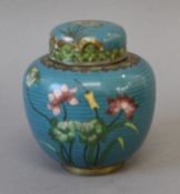 A cloisonne lidded ginger jar. 12 cm high.