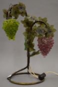 An unusual brass and glass table lamp formed as fruiting vines. 50 cm high.