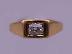 A 18 ct gold gentleman's diamond ring. Ring size V/W.