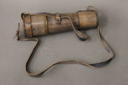 A leather cased brass telescope. 48 cm long extended.