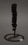 An early iron candlestick.