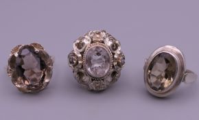 Three silver ladies stone set rings. 18.9 grammes total weight.