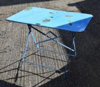 A French folding metal cafe table.