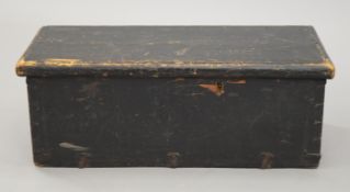 A small 19th century painted pine trunk. 57.5 cm wide.