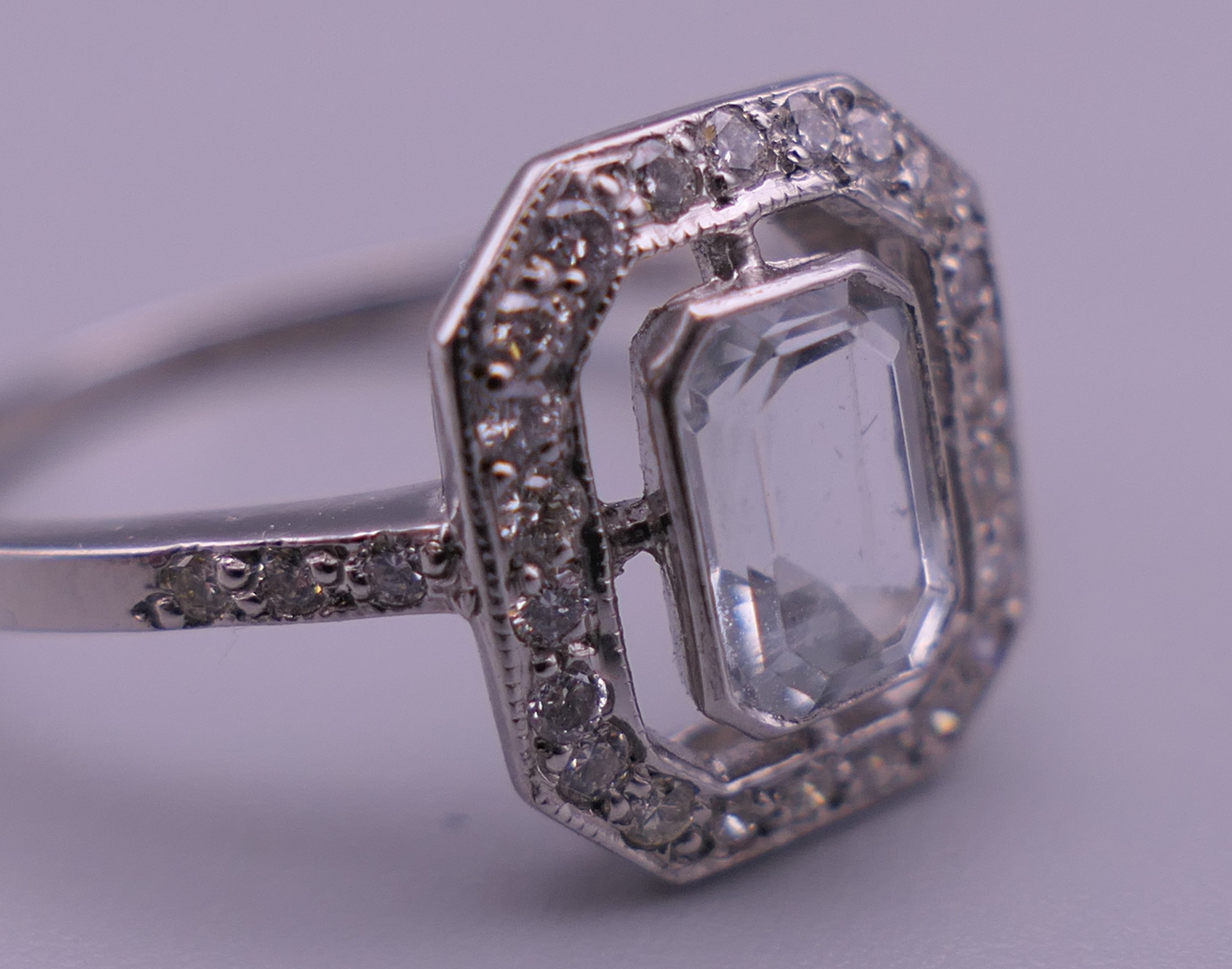 A platinum diamond and aquamarine ring. Ring size M/N. - Image 4 of 8