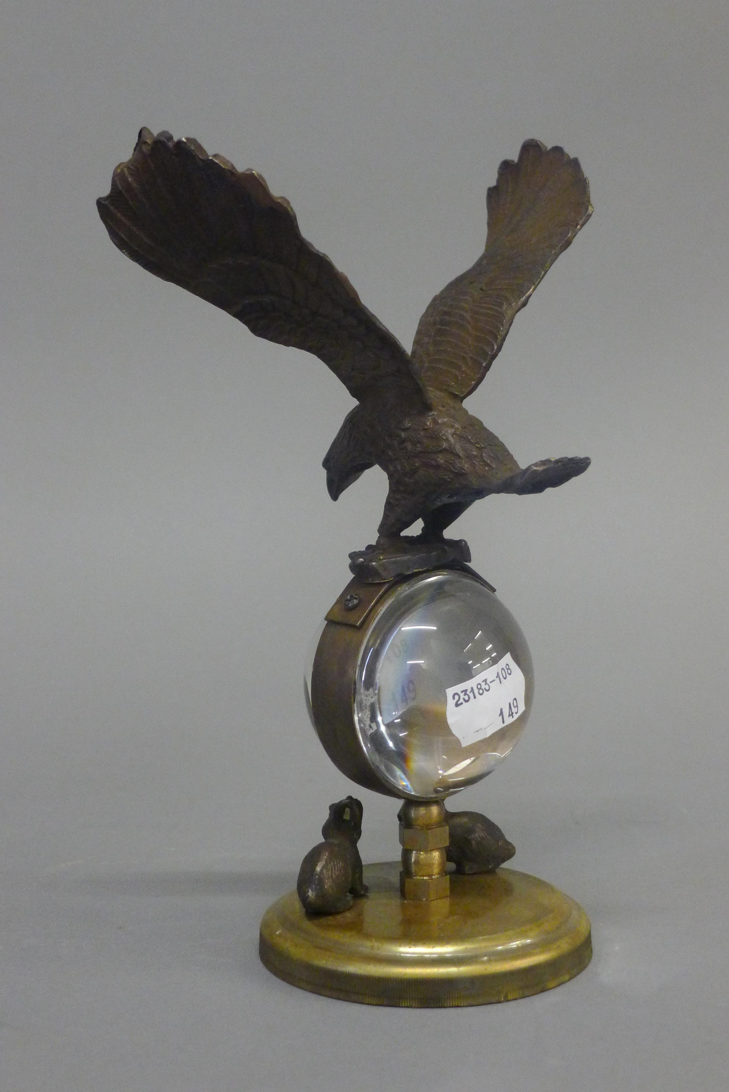 An eagle ball clock. 21.5 cm high. - Image 3 of 4