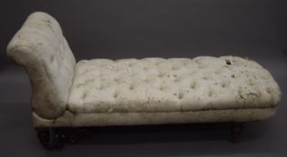 A Victorian button upholstered chaise lounge. Approximately 165 cm long.