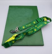 A Rolex folder and lanyard. Folder 31 cm x 22 cm.