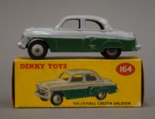 A 1950's Dinky/Meccano Vauxhall Cresta grey over green, boxed.