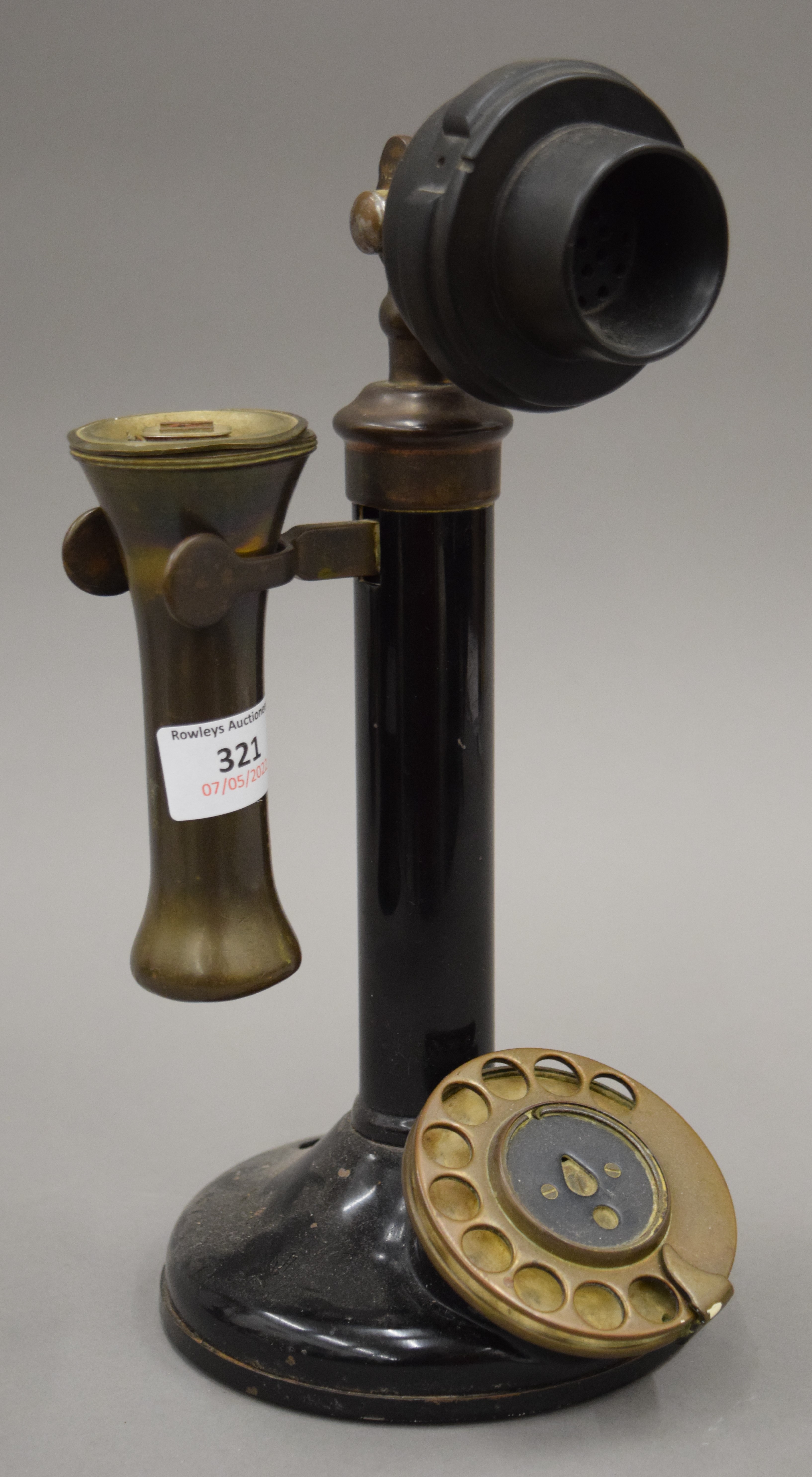 A vintage candlestick telephone. 29 cm high.