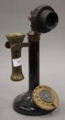 A vintage candlestick telephone. 29 cm high.