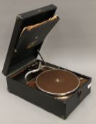 An HMV portable gramophone, in good working order. 42 cm wide.