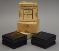 A collection of humorous and nursery rhyme magic lantern slides, some boxed.